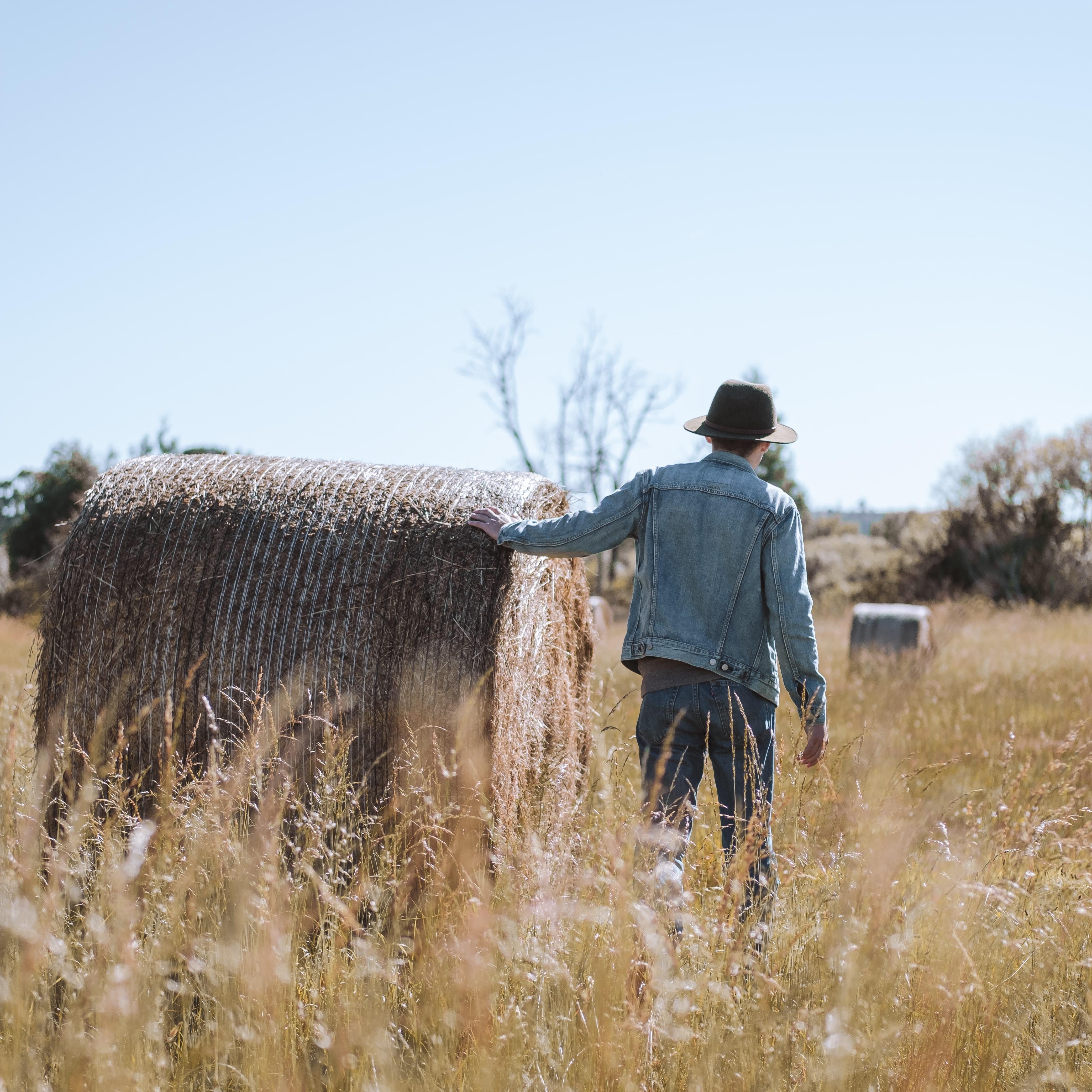 farmer with bale