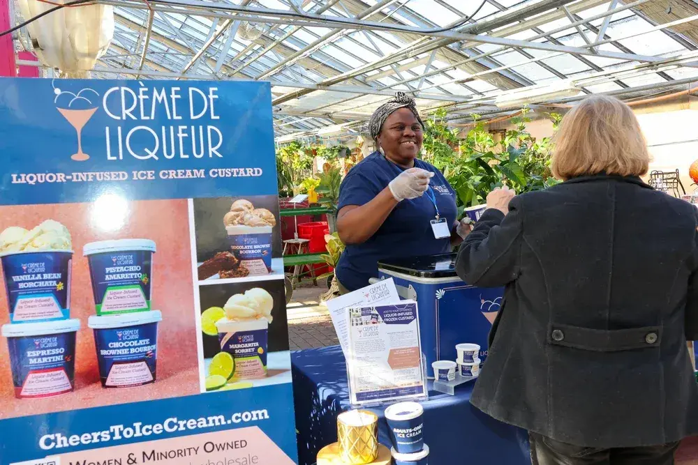 creme de liqueur food vendor at local food trade show